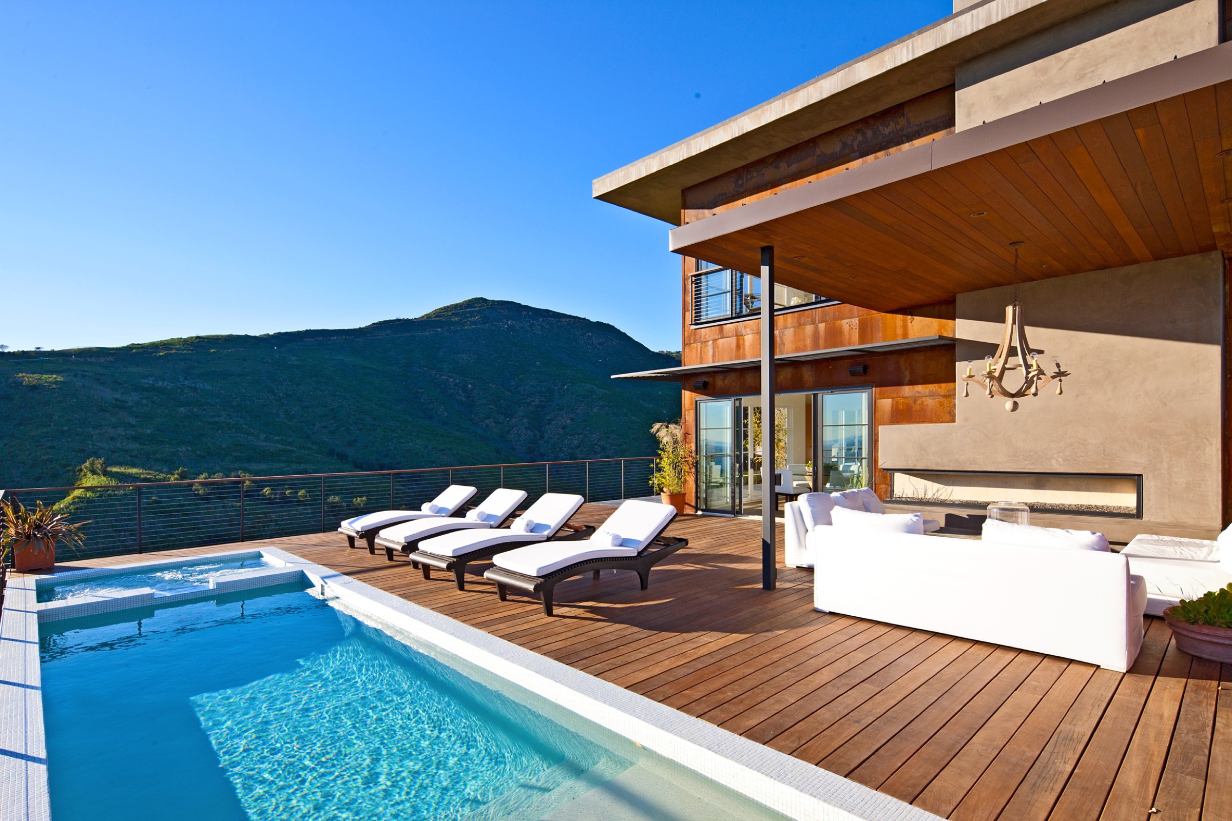 PAR Custom Homes hillside residence with pool and canyon views
